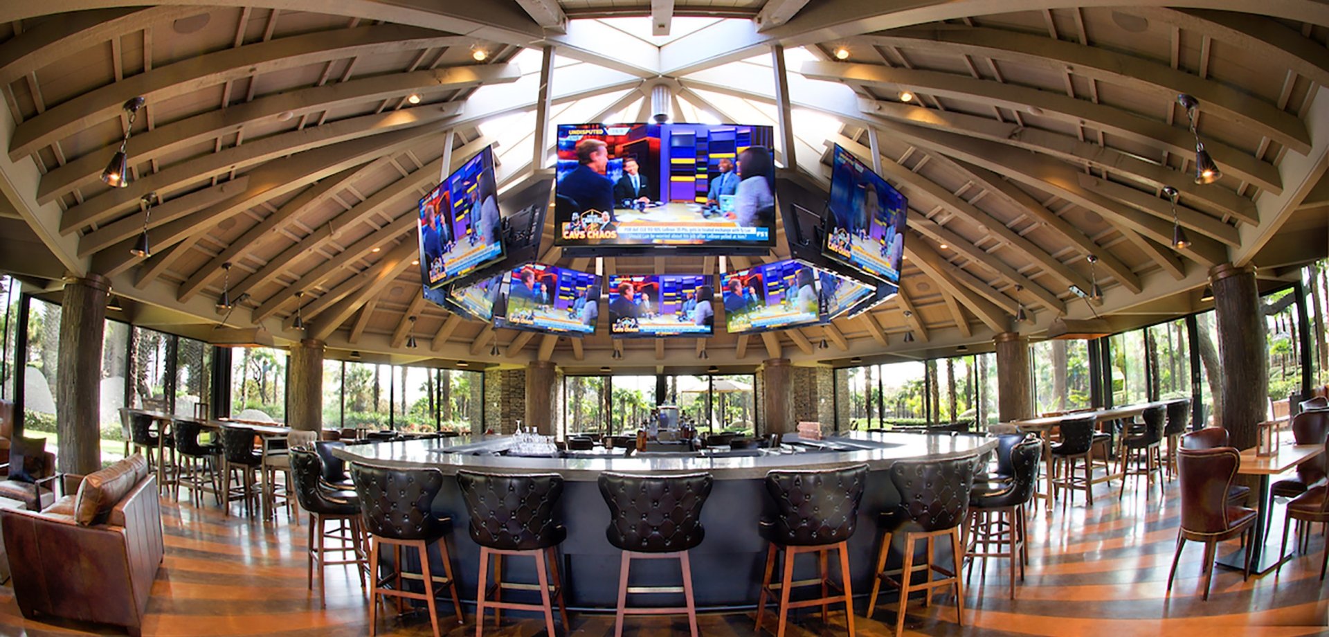 Sports bar with 360 views of TVs for all sport fans to watch.