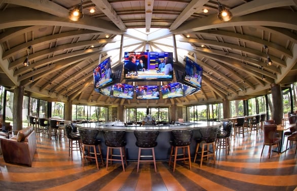 Sports bar with 360 views of TVs for all sport fans to watch.
