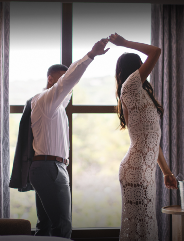Couple dancing in room