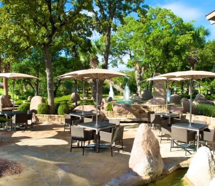 Outdoor seating overlooking the practice putting green.