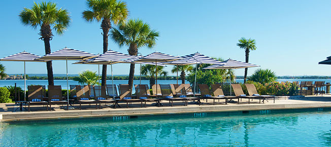 yacht club pool with lounge chairs