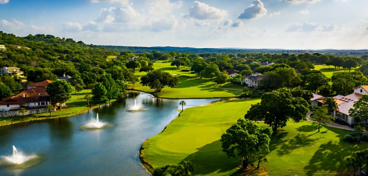 Golf Course with green trees and club house