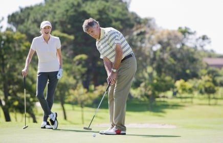 Golfer putting at Horseshoe Bay Resort