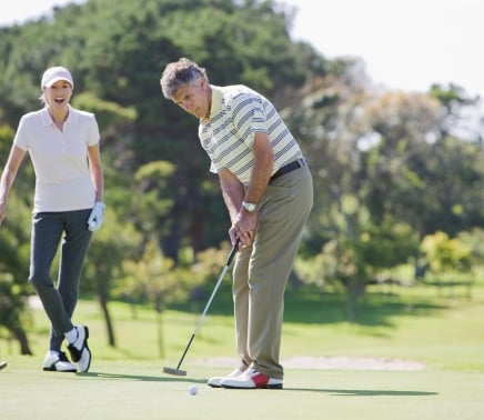 Golfer putting at Horseshoe Bay Resort