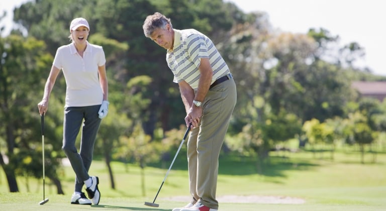 Golfer putting at Horseshoe Bay Resort