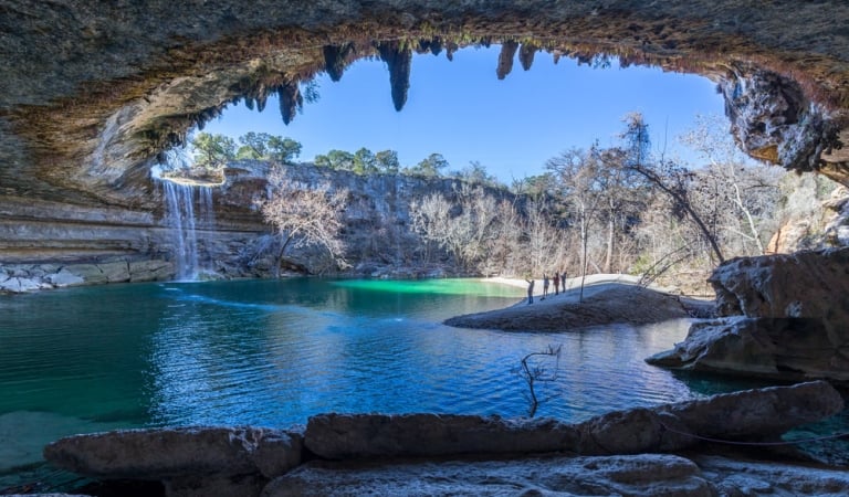 A large lagoon of water based in a cave