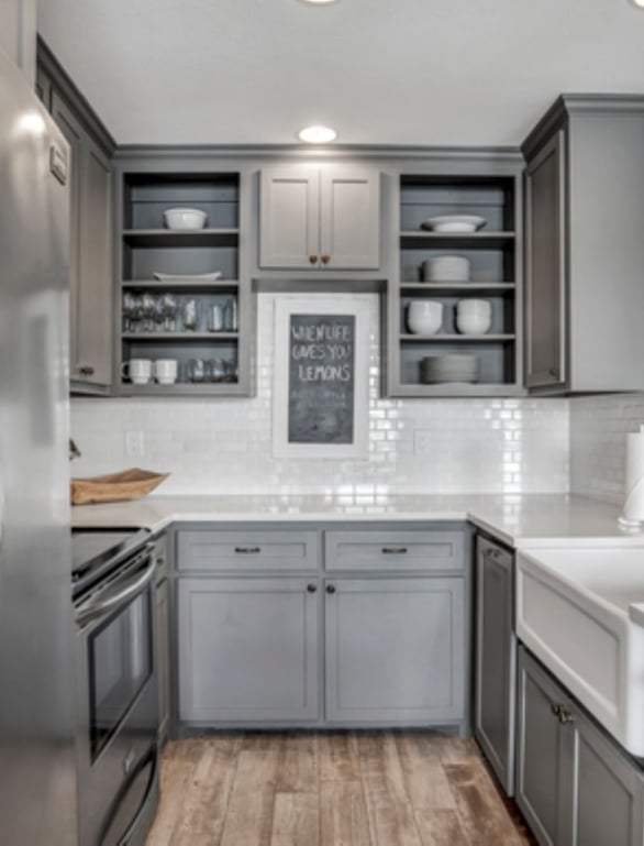 Kitchen with fridge and sink