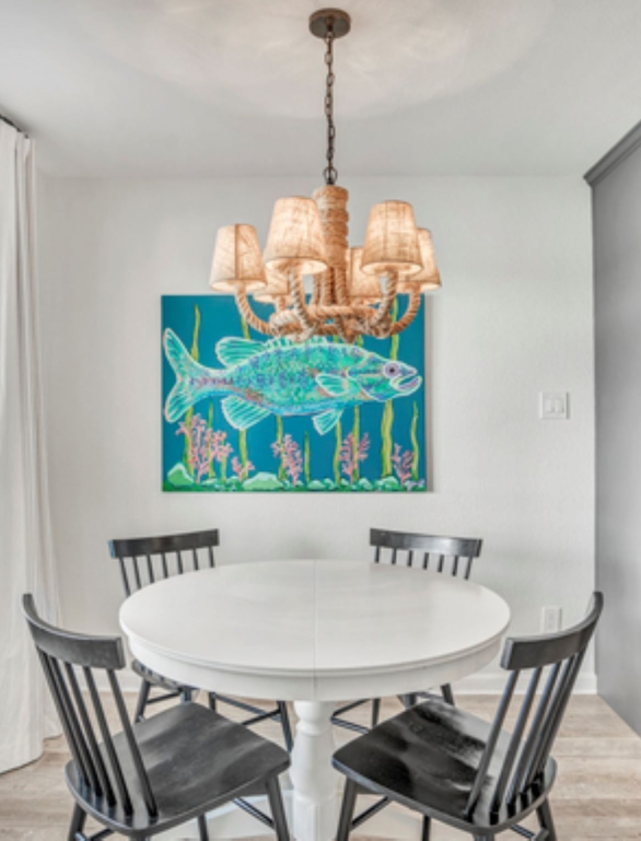 Dining room with art in the background