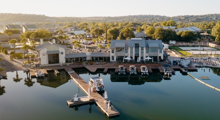 Lakeside restaurant with long pier going into Lake LBJ.