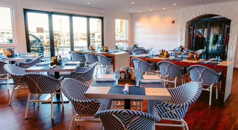 Casual indoor dining with lakeside views on the shores of Lake LBJ at Waterfront Bar and Grill, Horseshoe Bay Resort.