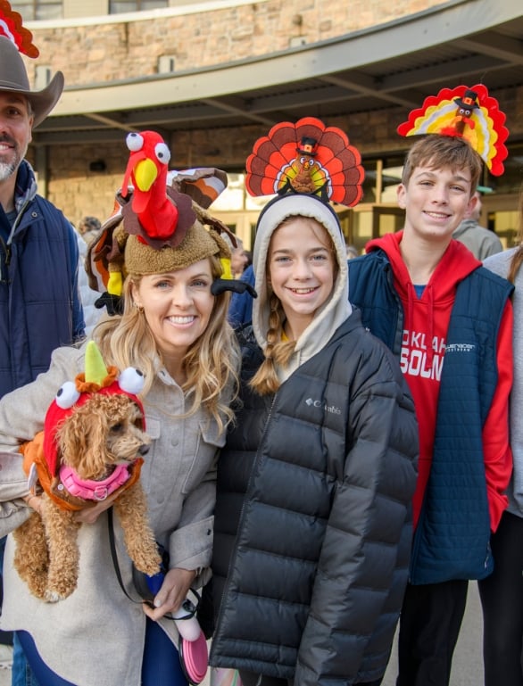 A family posing for a photo at the Turkey Trot