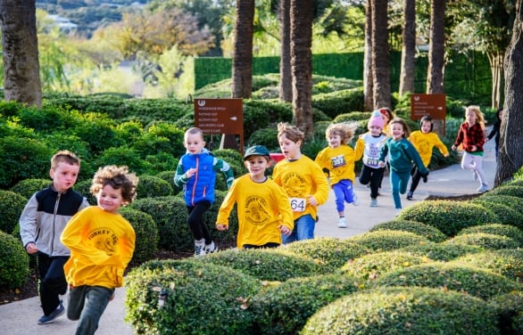 A group of children running in the Turkey Trot