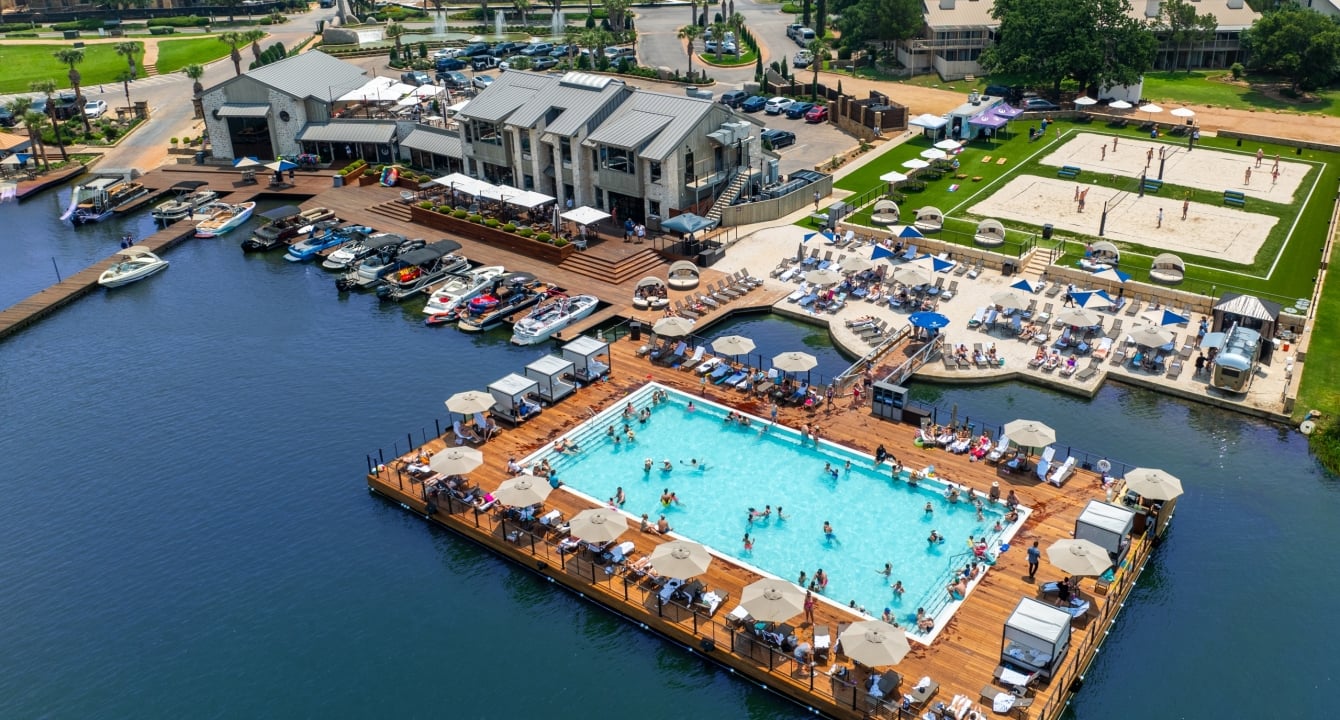 An aerial shot of the floating pool on Lake LBJ at Horseshoe Bay Resort