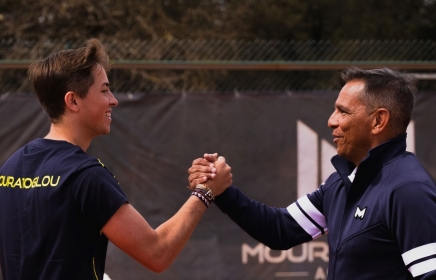 Coach and player shaking hands at Mouratoglou Tennis center at Horseshoe Bay Resort