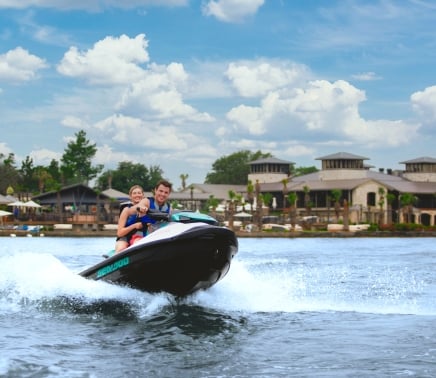People out on the water at horseshoe bay resort enjoying a jet ski ride