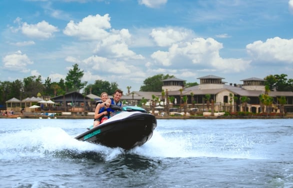 People out on the water at horseshoe bay resort enjoying a jet ski ride