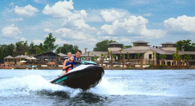 People out on the water at horseshoe bay resort enjoying a jet ski ride