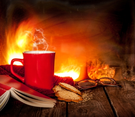 Hot drink in front of the fireplace