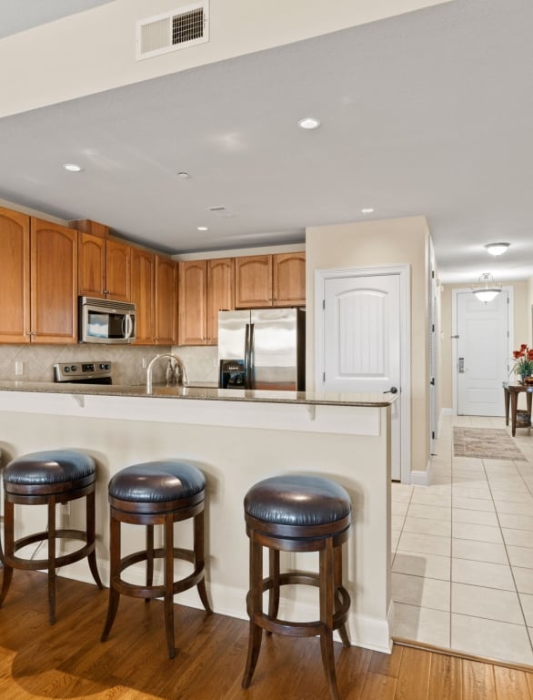 Kitchen and front hallway view of a condo at Horseshoe Bay Resort