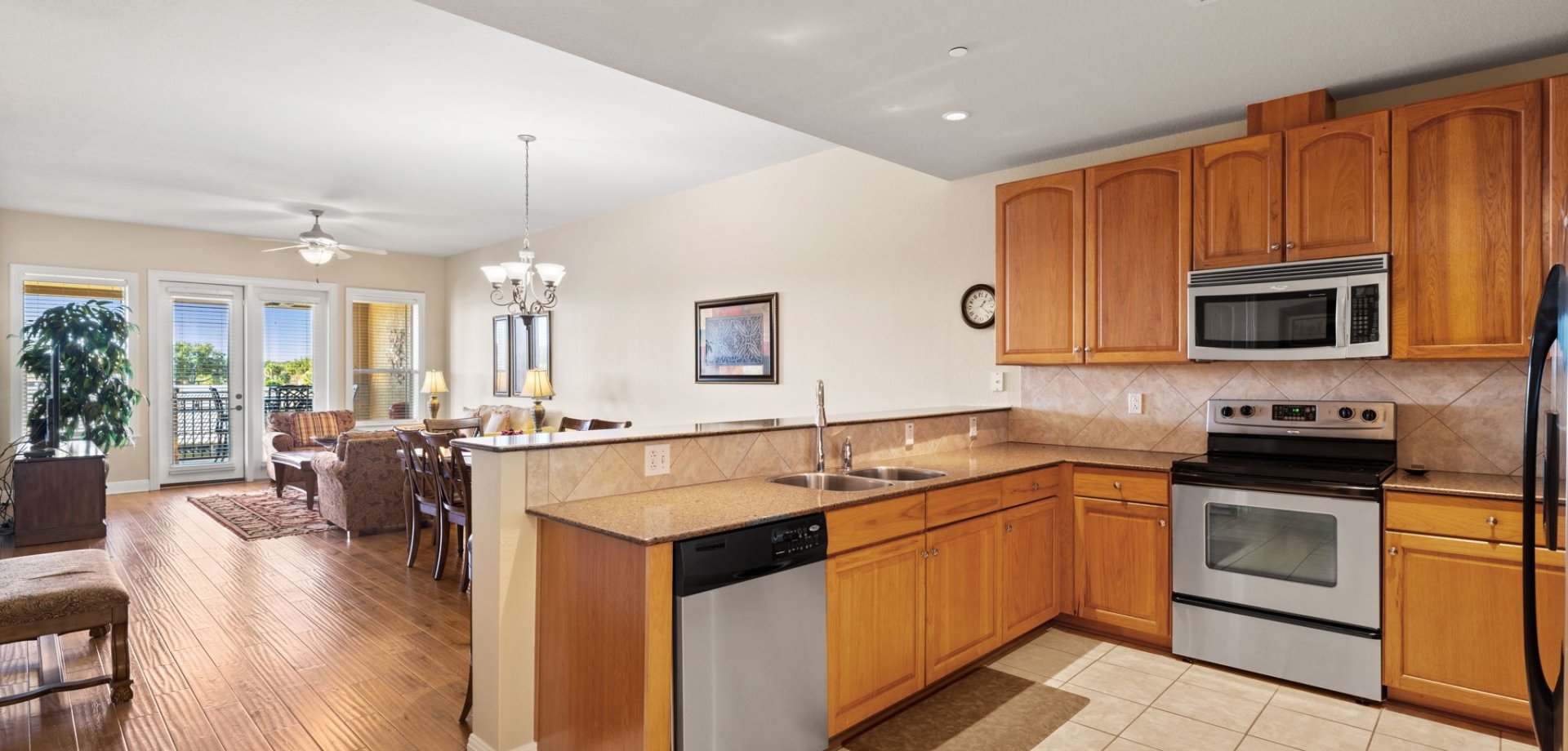 A view of the kitchen and living room at a condo at Horseshoe Bay Resort