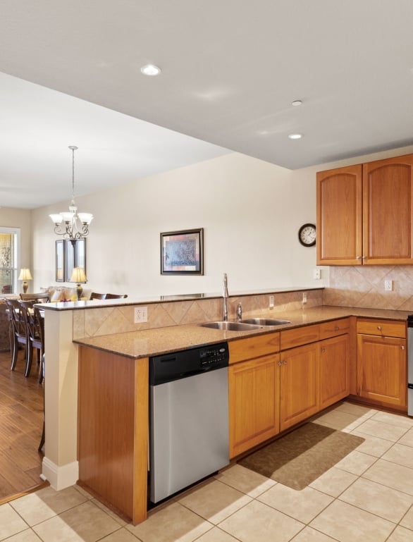 A view of the kitchen and living room at a condo at Horseshoe Bay Resort