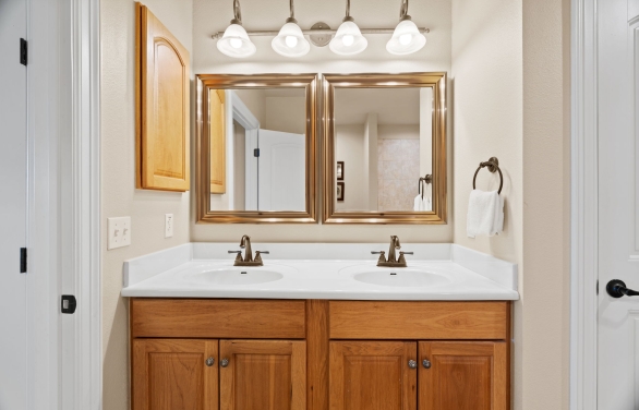 A Close up of the sinks in a bathroom inside a condo at Horseshoe Bay Resort