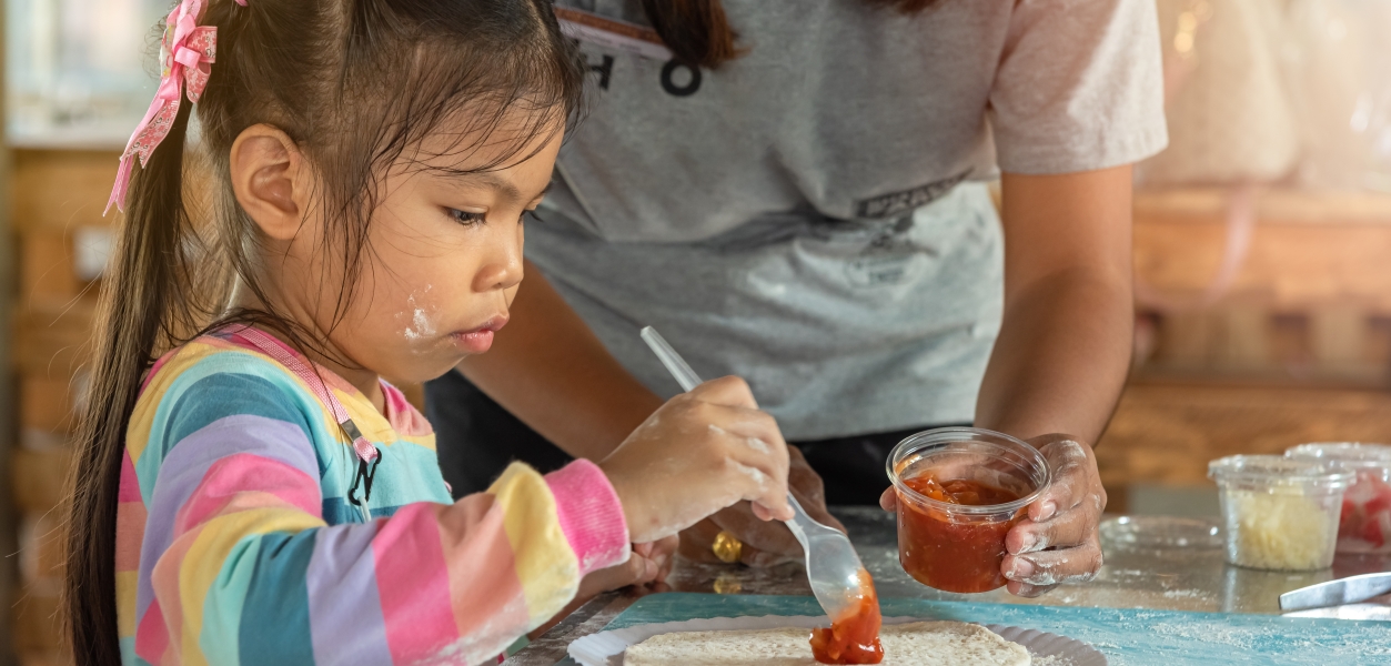little girl, kids, learning how to cool, cooking class, horseshoe bay resort Texas