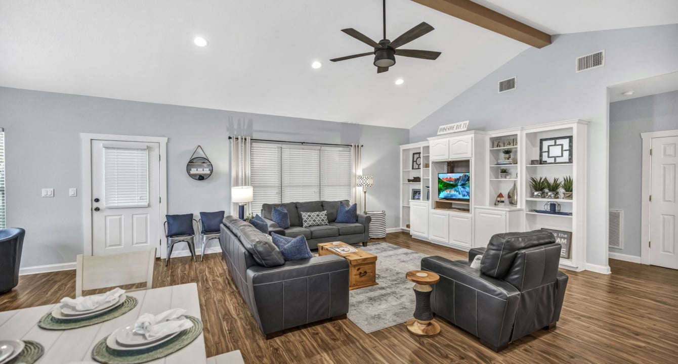 A living room at the Oasis at Horseshoe Bay Resort, the room has an open floor plan with couches and chairs