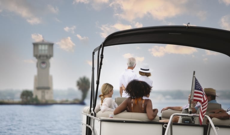a group of people enjoying a boating ride on the water at Horseshoe Bay Resort