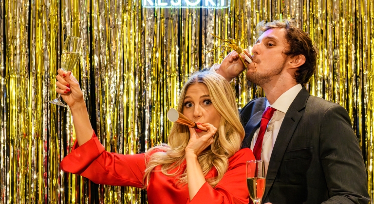 A man and woman enjoying a New Years Eve party at Horseshoe Bay Resort