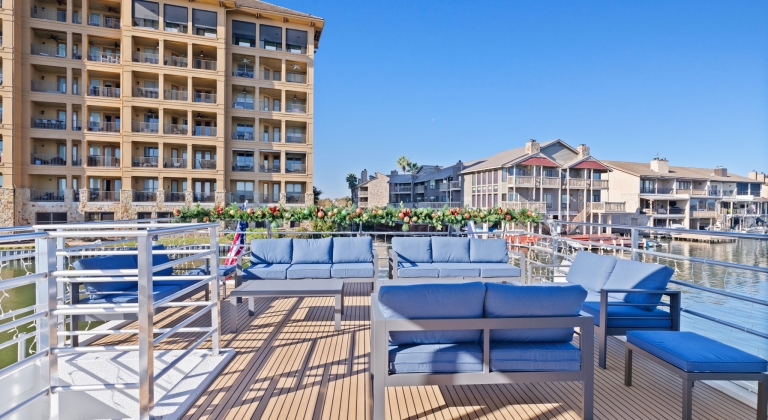 seating area on top of the lady bird II yacht at horseshoe bay resort