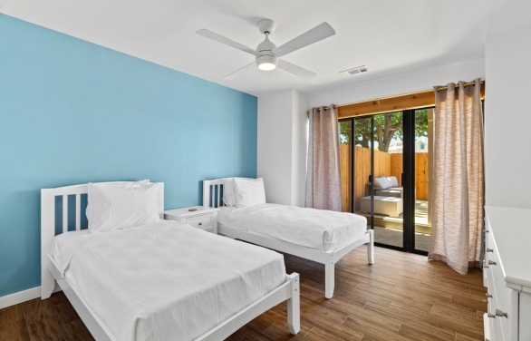 interior of a bedroom available at horseshoe bay resort with a private patio area