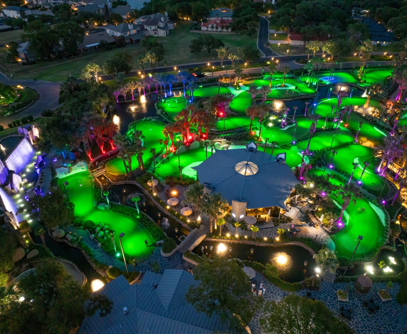 overhead view of whitewater golf course lit up for a drone show at horseshoe bay resort