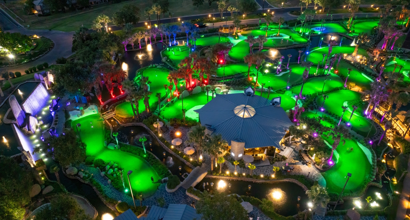 overhead view of whitewater golf course lit up for a drone show at horseshoe bay resort
