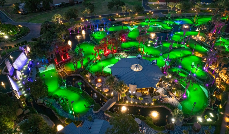 overhead view of whitewater golf course lit up for a drone show at horseshoe bay resort