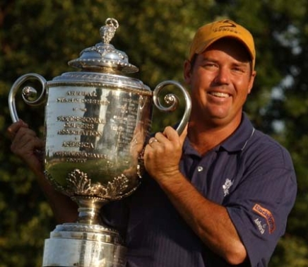 Rick Beem holding up his trophy