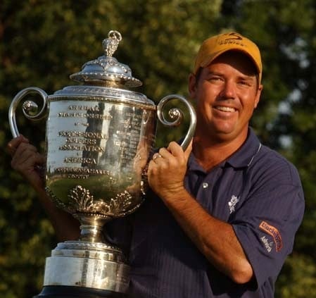 Rick Beem holding up his trophy